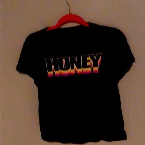 A plain black shirt with words on it